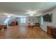 Spacious living room with hardwood floors and comfortable seating arrangement at 10625 Soma Ct, Raleigh, NC 27613