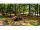 Charming Swim & Racquet Club brick sign surrounded by manicured landscaping at 10625 Soma Ct, Raleigh, NC 27613