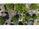 Aerial view of the house surrounded by mature trees at 107 Quarter Path, Cary, NC 27518
