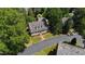 Aerial view of the house showcasing the roof, landscaping, and brick walkway to the front door at 107 Quarter Path, Cary, NC 27518