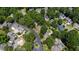 Wide aerial view of a neighborhood, showcasing mature trees at 107 Quarter Path, Cary, NC 27518