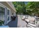 Relaxing back deck with comfortable seating, perfect for outdoor entertaining and leisure at 107 Quarter Path, Cary, NC 27518