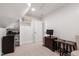 Finished bonus room with desk, shelving and seating perfect for an office or den at 107 Quarter Path, Cary, NC 27518