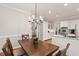 Dining room with view of the kitchen at 107 Quarter Path, Cary, NC 27518