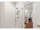 Modern shower with white subway tile, glass enclosure, and view into adjacent bedroom at 107 Quarter Path, Cary, NC 27518