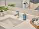 Close up of bathroom vanity with soap and towels at 108 Cedar St, Chapel Hill, NC 27514