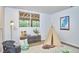 Fun room with playful decor, featuring a window with a view of the backyard at 108 Cedar St, Chapel Hill, NC 27514