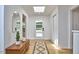 Foyer features wood floors, a skylight, and closet for storage at 108 Cedar St, Chapel Hill, NC 27514