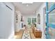 Bright foyer with wood floors, skylight, and an open view into the living room at 108 Cedar St, Chapel Hill, NC 27514