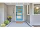 A closer view of the front door featuring its unique design and modern hardware at 108 Cedar St, Chapel Hill, NC 27514