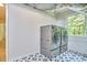 Laundry room with modern washer and dryer on a patterned tile floor at 108 Cedar St, Chapel Hill, NC 27514