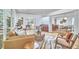 Open-concept living room with stylish furnishings and a smooth transition to dining area at 108 Cedar St, Chapel Hill, NC 27514