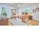 Warm and inviting bedroom with hardwood floors and large window at 108 Cedar St, Chapel Hill, NC 27514