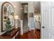 Inviting entryway with hardwood floors, staircase, and stylish decor at 109 Fox Trap Ct, Garner, NC 27529