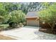 Spacious brick garage with a large driveway and a fenced backyard at 109 Fox Trap Ct, Garner, NC 27529
