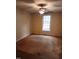 Bright bedroom with a ceiling fan and natural light, offering a comfortable space at 1106 Fargo St, Durham, NC 27707