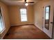Bright bedroom with a ceiling fan and large windows, providing ample light at 1106 Fargo St, Durham, NC 27707