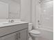 Clean bathroom featuring a modern vanity, toilet and shower/tub combo at 1114 Crossvine Trl, Durham, NC 27703