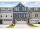 Beautifully designed townhome featuring modern architecture and well-maintained landscaping at 1114 Crossvine Trl, Durham, NC 27703