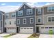 Attractive townhome showcases clean lines and an inviting facade at 1114 Crossvine Trl, Durham, NC 27703