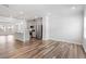 Open floor plan combines kitchen with island and adjacent living area, perfect for entertaining at 1114 Crossvine Trl, Durham, NC 27703