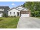 Charming single-Gathering home with a well-manicured lawn and a brick and siding facade at 112 Lager Ln, Garner, NC 27529
