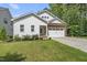 Charming single-Gathering home with a well-manicured lawn and a brick and siding facade at 112 Lager Ln, Garner, NC 27529