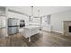 Bright open kitchen featuring an island and stainless steel appliances at 112 Lager Ln, Garner, NC 27529