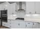 Bright open kitchen featuring stainless steel appliances and white subway tile backsplash at 112 Lager Ln, Garner, NC 27529