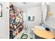 Well-maintained bathroom features marble shower, wood-look countertops, and elegant fixtures at 1120 E Oak Dr, Durham, NC 27712