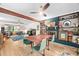 Open dining area includes a charming blue brick fireplace with built-in shelving and views into the living area at 1120 E Oak Dr, Durham, NC 27712