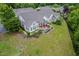 Inviting single-Gathering home showcasing a lovely patio area with outdoor seating, perfect for relaxation at 1167 Blue Bird Ln, Wake Forest, NC 27587