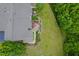 A bird's-eye view of a home with an attractive patio area with outdoor seating and well-kept lawn at 1167 Blue Bird Ln, Wake Forest, NC 27587