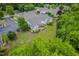 Charming single-Gathering home featuring a well-maintained lawn and a welcoming outdoor patio area at 1167 Blue Bird Ln, Wake Forest, NC 27587