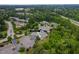 Aerial view of 1167 Blue Bird property surrounded by lush greenery and well-manicured lawns at 1167 Blue Bird Ln, Wake Forest, NC 27587