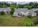 Beautifully maintained home featuring a spacious lawn and an inviting patio area with outdoor furniture at 1167 Blue Bird Ln, Wake Forest, NC 27587