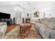 Well-lit living room showcasing a fireplace, vaulted ceiling, and elegant decor in a relaxing atmosphere at 1167 Blue Bird Ln, Wake Forest, NC 27587