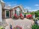 Inviting outdoor patio with brick flooring and comfortable seating, perfect for relaxing at 1167 Blue Bird Ln, Wake Forest, NC 27587