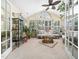Bright and airy sunroom with lots of natural light and comfortable seating arrangements at 1167 Blue Bird Ln, Wake Forest, NC 27587