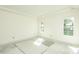Bright bedroom features two windows providing natural light, with space for customization and finishing touches at 1229 Lawndale Dr, Graham, NC 27253