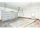 Spacious garage with ample room for vehicles and storage, awaiting your personal touch at 1229 Lawndale Dr, Graham, NC 27253