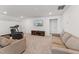 Spacious bonus room offers comfortable seating and a flat screen television at 125 Alumroot Rd, Holly Springs, NC 27540