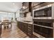 Elegant kitchen featuring stainless steel appliances and plenty of counter space at 125 Alumroot Rd, Holly Springs, NC 27540