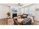 Comfortable living room features a fireplace, plush seating, and a decorative rug at 125 Alumroot Rd, Holly Springs, NC 27540