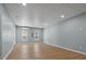 Spacious basement with wood flooring, large windows and recessed lighting at 145 Mariah Towns Way, Garner, NC 27529