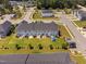 An aerial view of the townhome community featuring a well-maintained lawn at 150 Gosford Ln, Garner, NC 27529