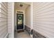Front door with welcome mat and wreath at 150 Gosford Ln, Garner, NC 27529