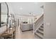 Open-concept living room and kitchen featuring hardwood floors and modern decor at 150 Gosford Ln, Garner, NC 27529