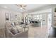 Inviting living room and kitchen featuring stainless steel appliances and an island with bar seating at 150 Gosford Ln, Garner, NC 27529