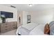 Bright main bedroom with a walk-in closet, light walls, and comfortable neutral decor at 150 Gosford Ln, Garner, NC 27529